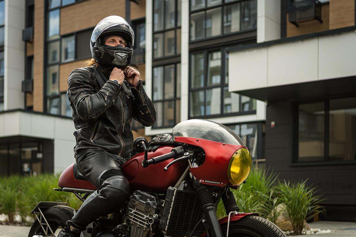 Biker wears safety helmet